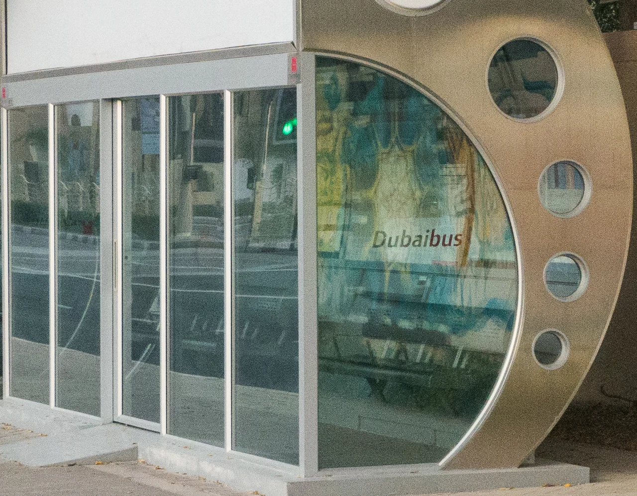 Real enclosed air conditioned bus shelter in Dubai, shown as a setting example